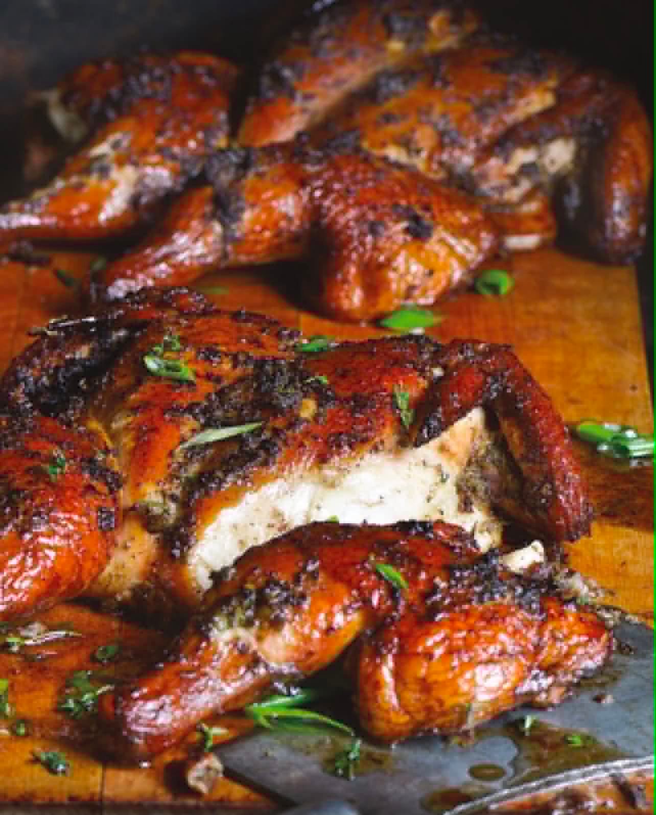 Rena's jerk chicken, fire roasted whole and glazed with jerk seasoning