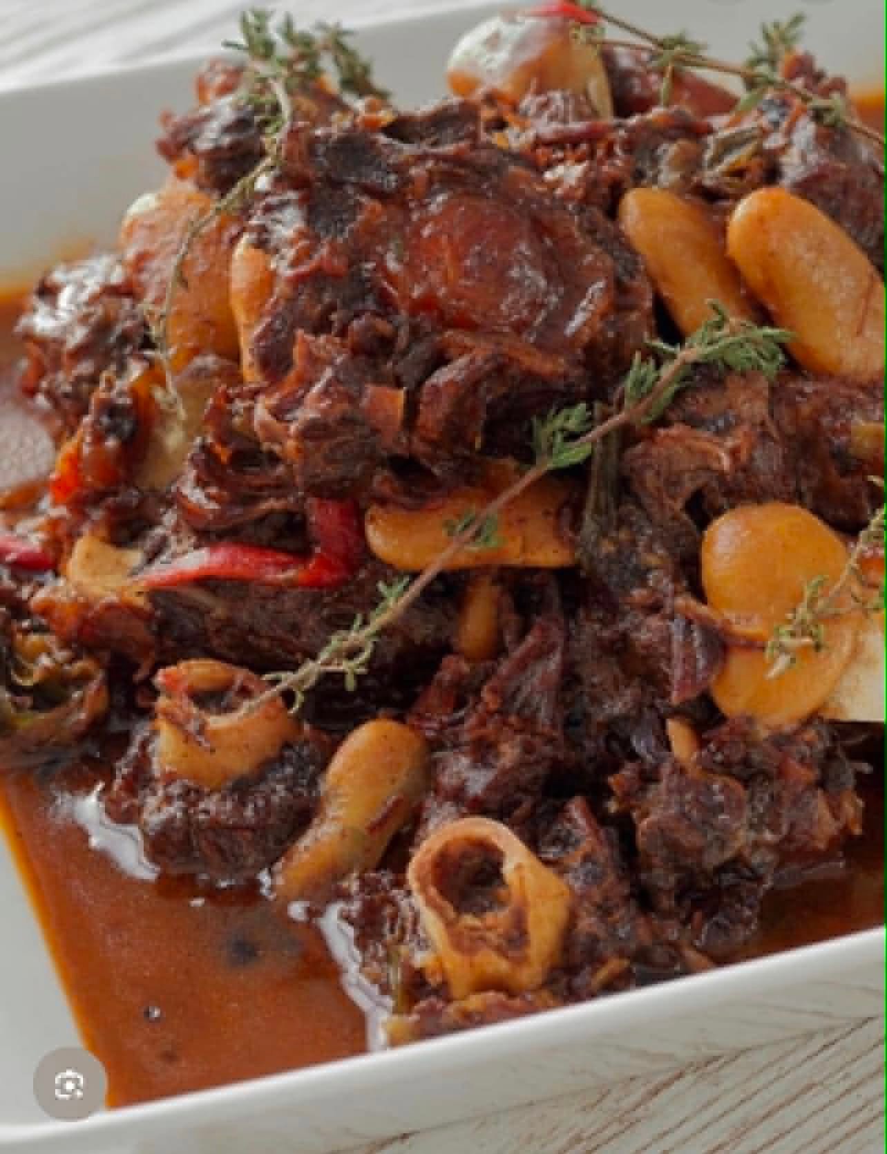 Rena's oxtail stew with butter beans in a rich brown gravy